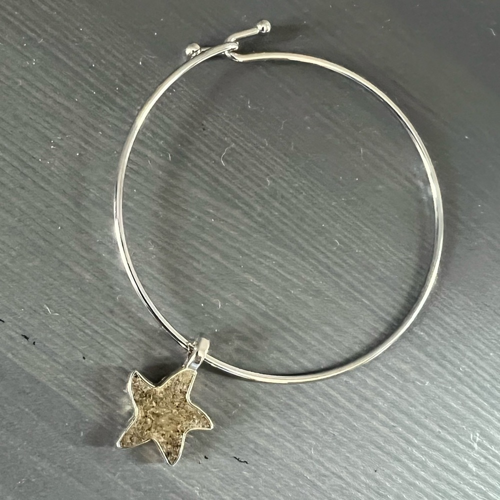 Starfish charm bracelet from Dune jewelry.